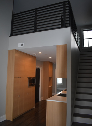 view of stairs and loft